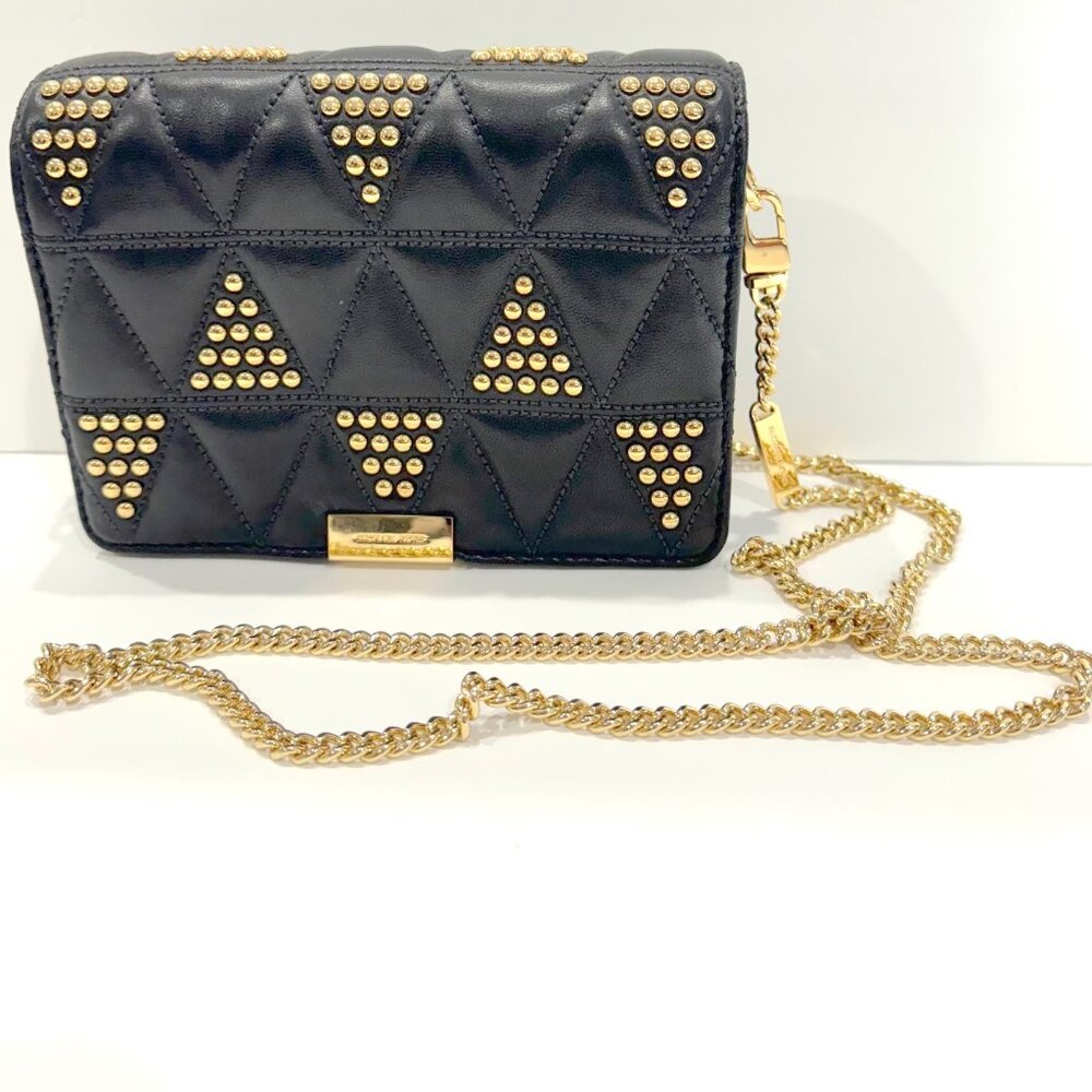 Micheal kors handbag Black and gold used once